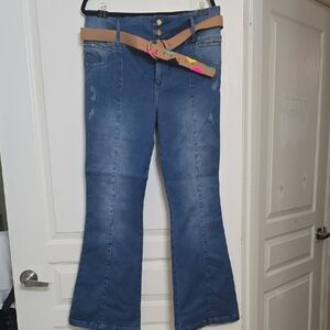 Elegant Blue Flare Jeans with Tan Belt